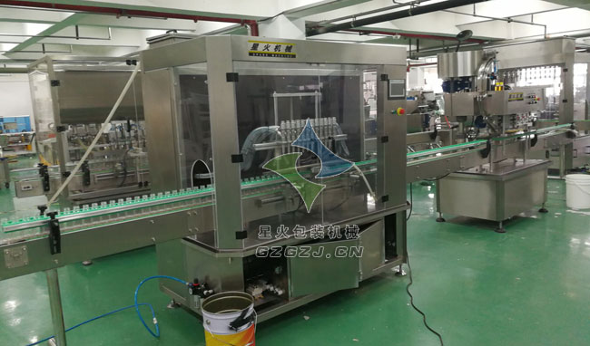 液體全自動(dòng)灌裝旋蓋生產(chǎn)線